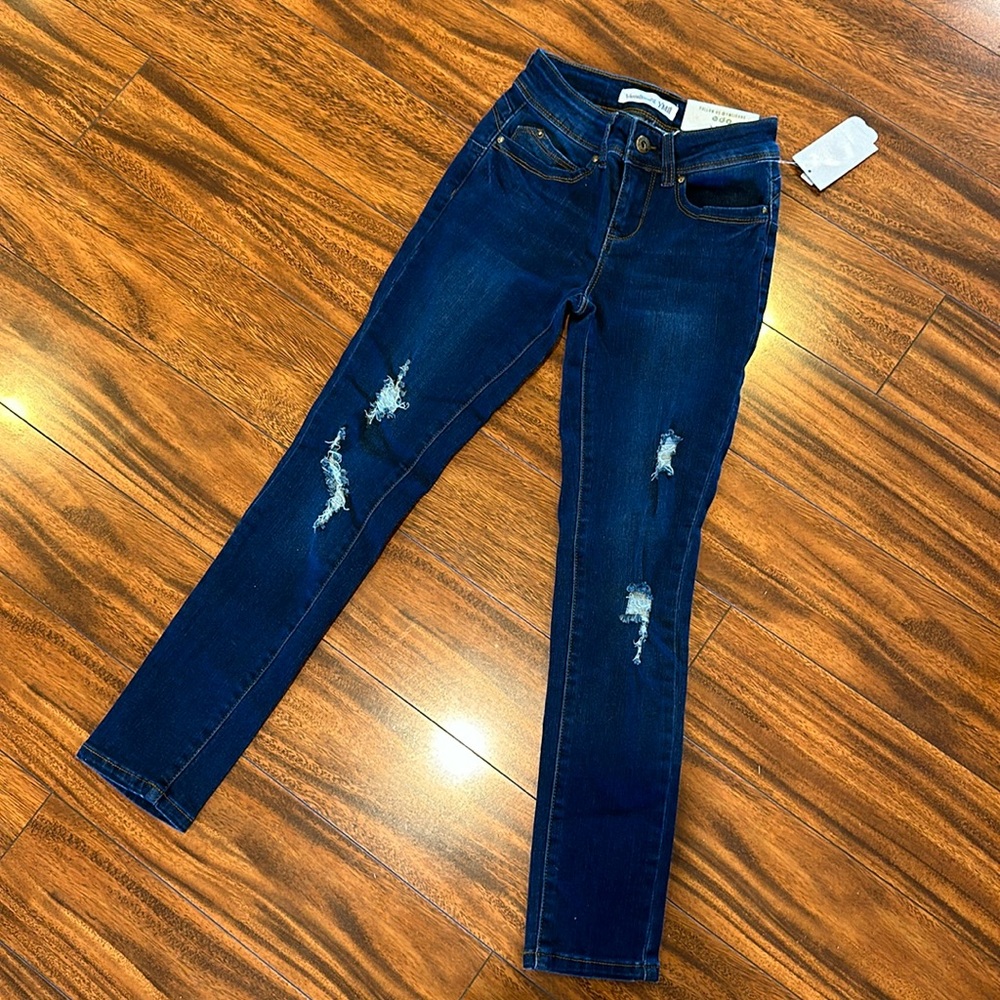 YMI skinny jeans with holes. New with tags